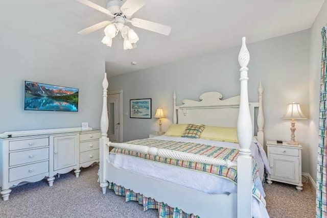 carpeted bedroom with a ceiling fan