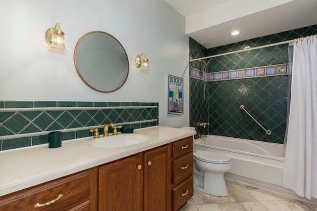 bathroom featuring vanity, toilet, and shower / bath combo with shower curtain