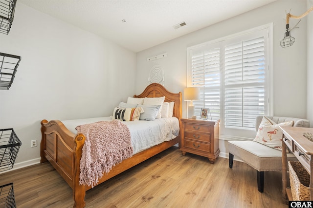 1113 Pirates Way Unit 1113, Manteo, NC 27954 - bedroom featuring light wood-style floors and baseboards