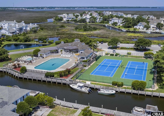 1113 Pirates Way Unit 1113, Manteo, NC 27954 - aerial view of residential area featuring a nearby body of water and a pool area