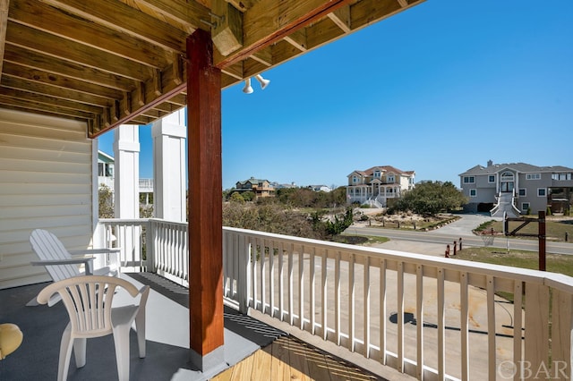 balcony featuring a residential view