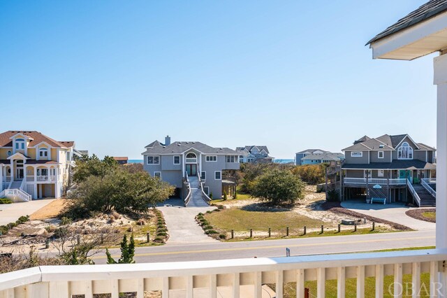 exterior space with stairs and a residential view