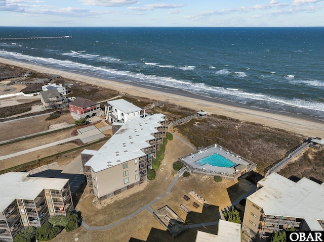 bird's eye view with a beach view and a water view