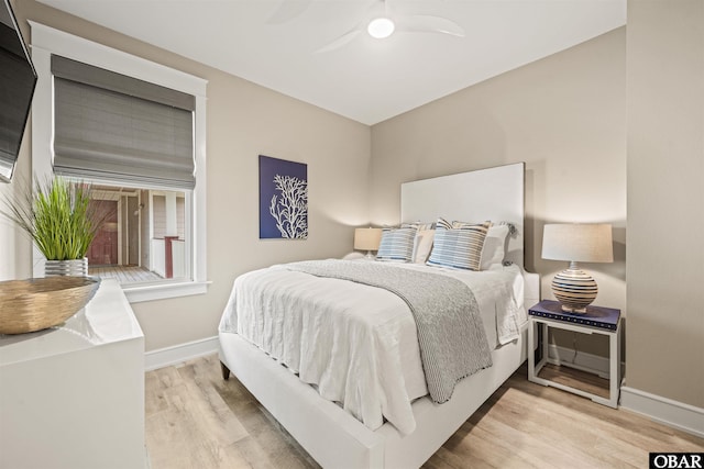 202 Dartmoor Ave Unit 202-C, Manteo, NC 27954 - bedroom featuring wood finished floors, baseboards, and ceiling fan