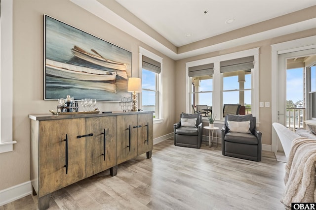 202 Dartmoor Ave Unit 202-C, Manteo, NC 27954 - sitting room with light wood-style flooring and baseboards