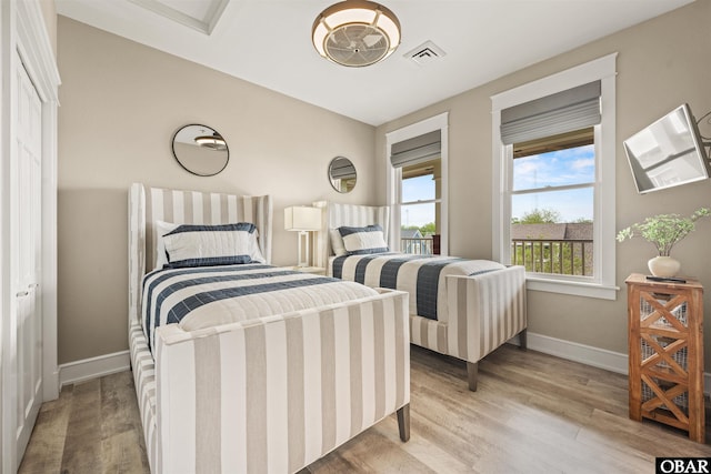 202 Dartmoor Ave Unit 202-C, Manteo, NC 27954 - bedroom with light wood-style floors and baseboards