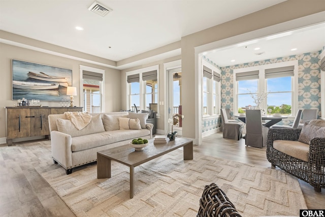 202 Dartmoor Ave Unit 202-C, Manteo, NC 27954 - living room featuring light wood-style flooring, baseboards, and recessed lighting