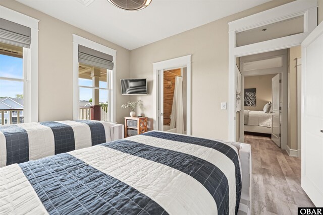 202 Dartmoor Ave Unit 202-C, Manteo, NC 27954 - bedroom with light wood-style flooring and baseboards