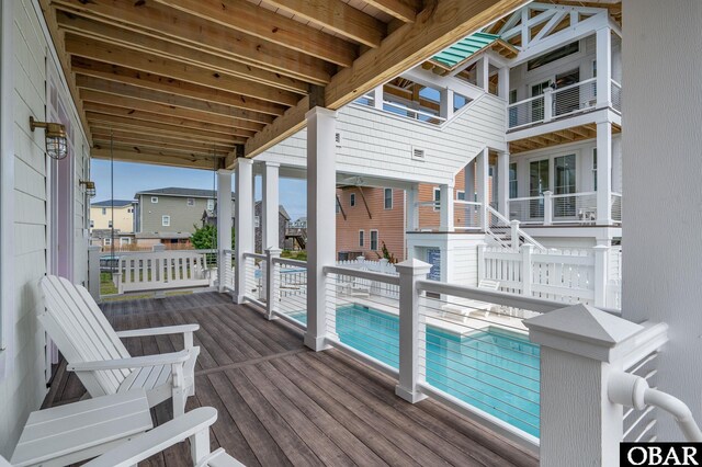 5118 N Virginia Dare Trl Lot 7, Kitty Hawk, NC 27949 - wooden terrace featuring a residential view and an outdoor pool