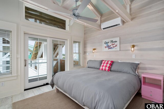 5118 N Virginia Dare Trl Lot 7, Kitty Hawk, NC 27949 - bedroom featuring access to exterior, a wall mounted air conditioner, multiple windows, wood walls, and beamed ceiling