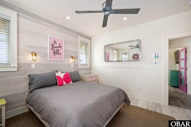 5118 N Virginia Dare Trl Lot 7, Kitty Hawk, NC 27949 - bedroom featuring wood finished floors, wainscoting, recessed lighting, and a ceiling fan