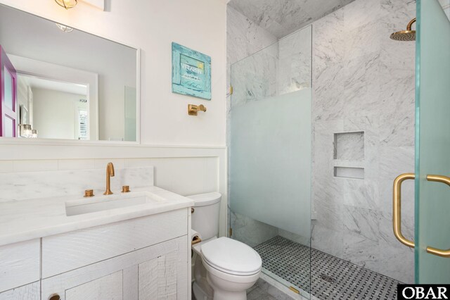 5118 N Virginia Dare Trl Lot 7, Kitty Hawk, NC 27949 - full bath featuring a marble finish shower, vanity, and wainscoting