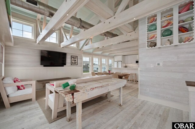 5118 N Virginia Dare Trl Lot 7, Kitty Hawk, NC 27949 - recreation room featuring light wood-type flooring, wooden walls, high vaulted ceiling, beam ceiling, and a skylight