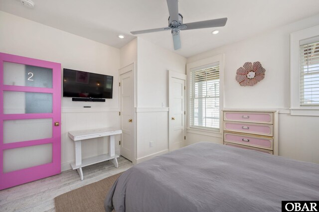5118 N Virginia Dare Trl Lot 7, Kitty Hawk, NC 27949 - bedroom featuring wood finished floors, recessed lighting, a wainscoted wall, and ceiling fan