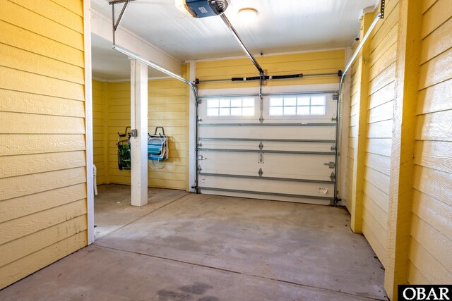 garage featuring a garage door opener