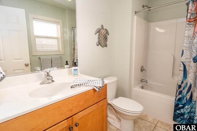 full bathroom featuring toilet, shower / tub combo, vanity, and tile patterned floors