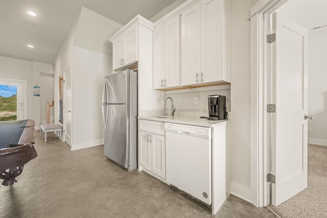 2103 Sandfiddler Rd Lot # 25, Corolla, NC 27927 - kitchen with freestanding refrigerator, white dishwasher, a sink, baseboards, and light countertops