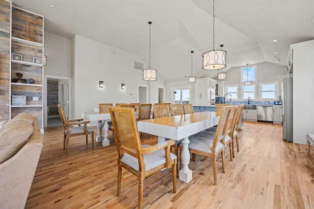 2103 Sandfiddler Rd Lot # 25, Corolla, NC 27927 - dining space featuring light wood finished floors, high vaulted ceiling, and recessed lighting