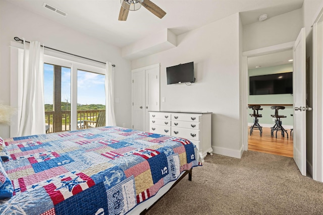 2103 Sandfiddler Rd Lot # 25, Corolla, NC 27927 - bedroom with carpet, access to exterior, a ceiling fan, and baseboards
