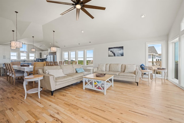 2103 Sandfiddler Rd Lot # 25, Corolla, NC 27927 - living area with a ceiling fan, light wood-type flooring, high vaulted ceiling, and recessed lighting