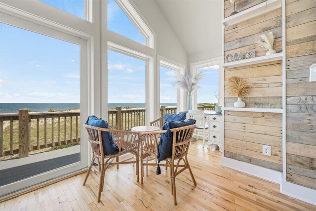 2103 Sandfiddler Rd Lot # 25, Corolla, NC 27927 - sunroom / solarium with wood-type flooring, high vaulted ceiling, and a deck with water view