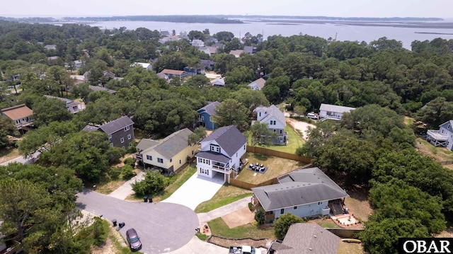 aerial view featuring a residential view and a water view