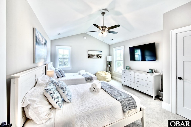 bedroom featuring visible vents, light colored carpet, ceiling fan, and vaulted ceiling