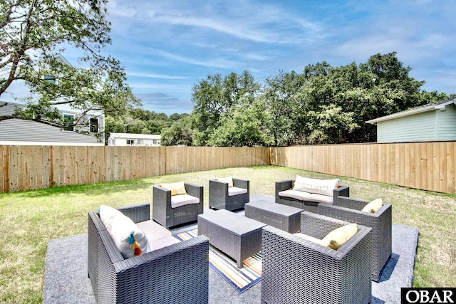 view of patio featuring a fenced backyard and outdoor lounge area