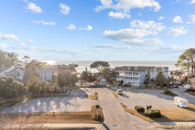 aerial view featuring a residential view and a water view