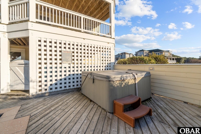 deck with a hot tub