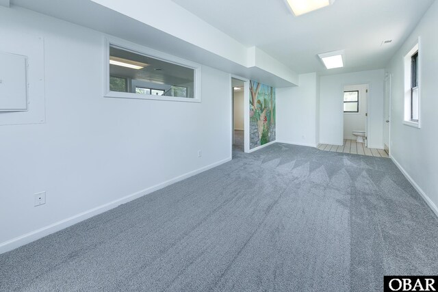 5707 Caratoke Hwy, Poplar Branch, NC 27965 - unfurnished room featuring carpet floors and baseboards