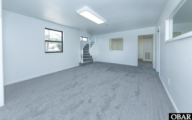 5707 Caratoke Hwy, Poplar Branch, NC 27965 - carpeted empty room featuring stairs, baseboards, and visible vents