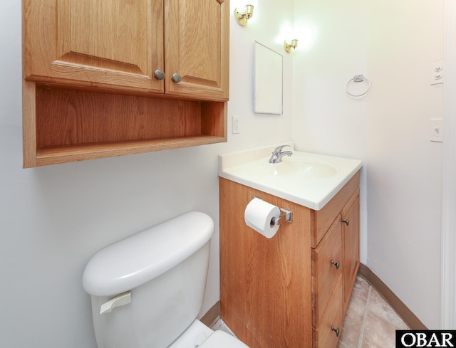 5707 Caratoke Hwy, Poplar Branch, NC 27965 - bathroom with vanity, baseboards, and toilet