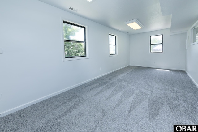 5707 Caratoke Hwy, Poplar Branch, NC 27965 - carpeted spare room with visible vents and baseboards