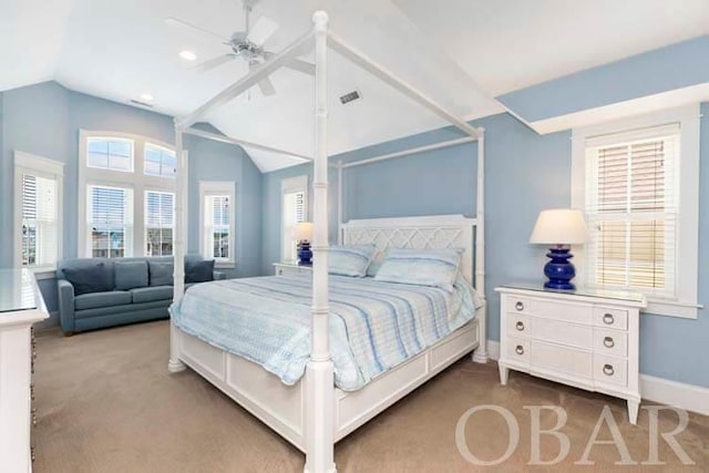 bedroom featuring lofted ceiling, visible vents, dark carpet, ceiling fan, and baseboards