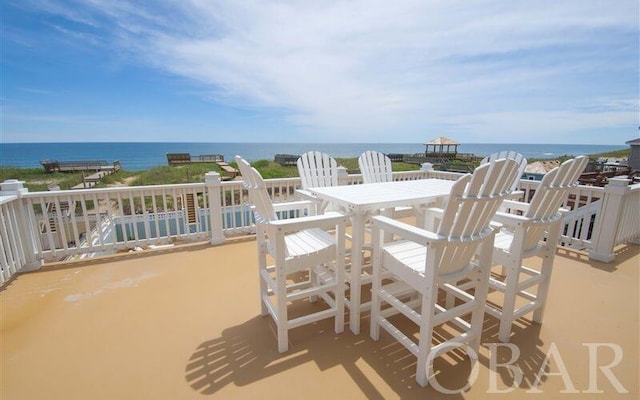 view of patio featuring a water view