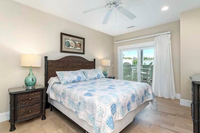 1905 S Virginia Dare Trl Lot E 3, Kill Devil Hills, NC 27948 - bedroom with access to outside, baseboards, ceiling fan, and light wood-style floors