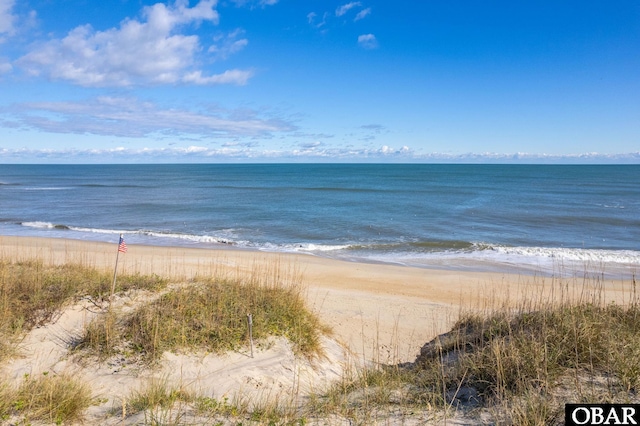 view of water feature featuring a beach view
