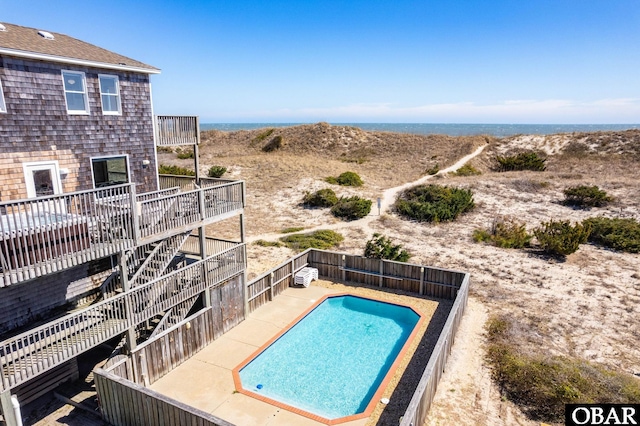 view of swimming pool featuring a patio area, a fenced in pool, and a fenced backyard