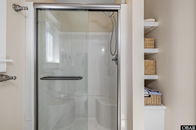 full bathroom with a stall shower