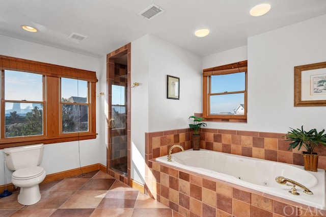 full bathroom featuring toilet, a garden tub, a shower stall, and visible vents