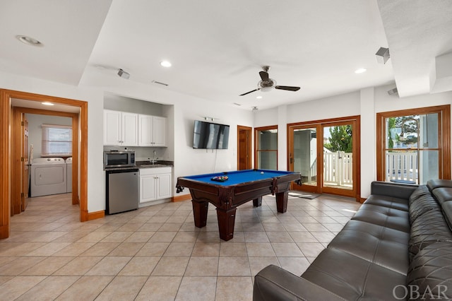 game room featuring light tile patterned floors, recessed lighting, billiards, and independent washer and dryer