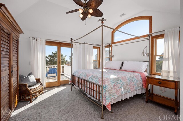 bedroom featuring visible vents, a ceiling fan, lofted ceiling, access to outside, and dark colored carpet