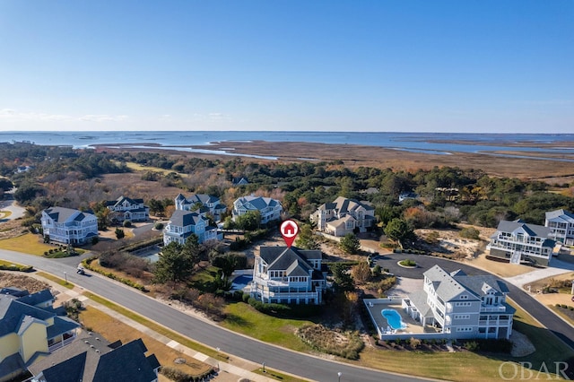 aerial view featuring a water view and a residential view