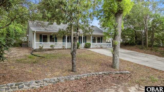 106 Mybet Ct Lot 97, Kill Devil Hills, NC 27948 - view of front of property with a porch, cooling unit, and concrete driveway