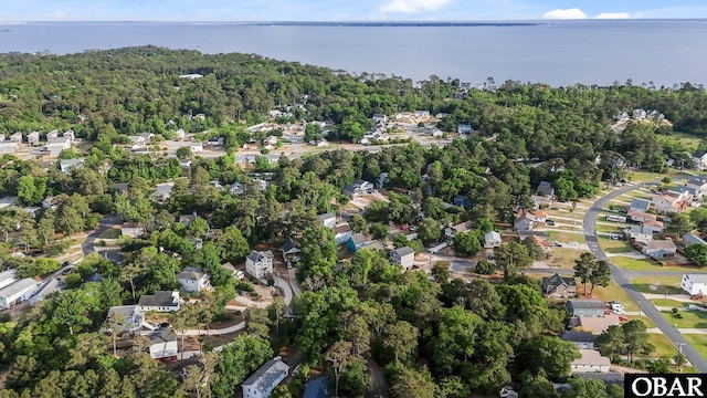 106 Mybet Ct Lot 97, Kill Devil Hills, NC 27948 - view of property location featuring a large body of water, a forest, and nearby suburban area
