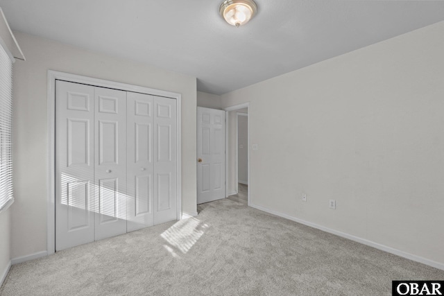 106 Mybet Ct Lot 97, Kill Devil Hills, NC 27948 - unfurnished bedroom featuring carpet flooring, baseboards, and a closet