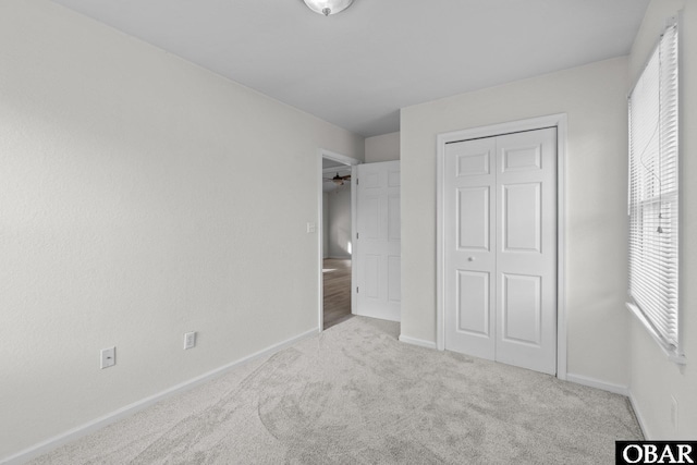 106 Mybet Ct Lot 97, Kill Devil Hills, NC 27948 - unfurnished bedroom featuring baseboards, carpet, and a closet