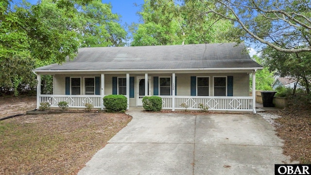 106 Mybet Ct Lot 97, Kill Devil Hills, NC 27948 - view of front facade with a porch and a shingled roof