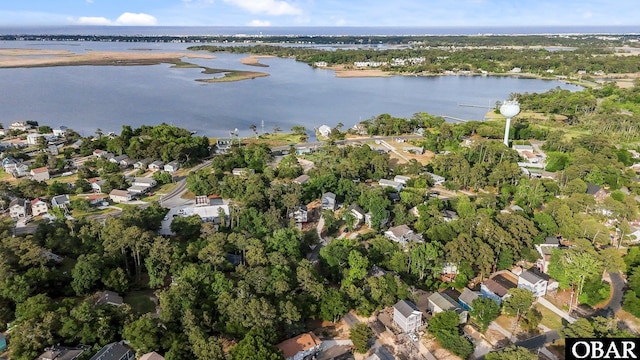 106 Mybet Ct Lot 97, Kill Devil Hills, NC 27948 - aerial overview of property's location with a nearby body of water, nearby suburban area, and a tree filled landscape
